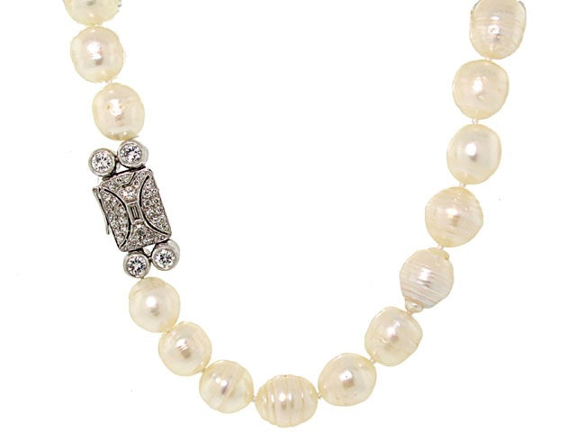 Mid-Century Baroque Pearl Strand with Diamond Clasp in Platinum