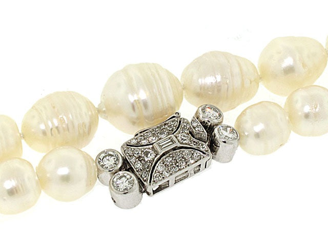 Mid-Century Baroque Pearl Strand with Diamond Clasp in Platinum