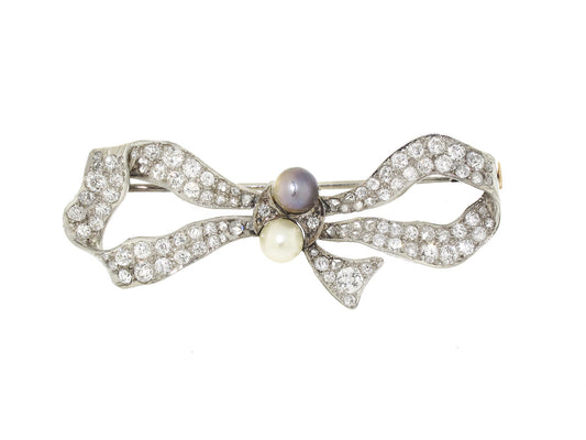 Antique Edwardian Diamond and Natural Pearl Bow Brooch in Platinum