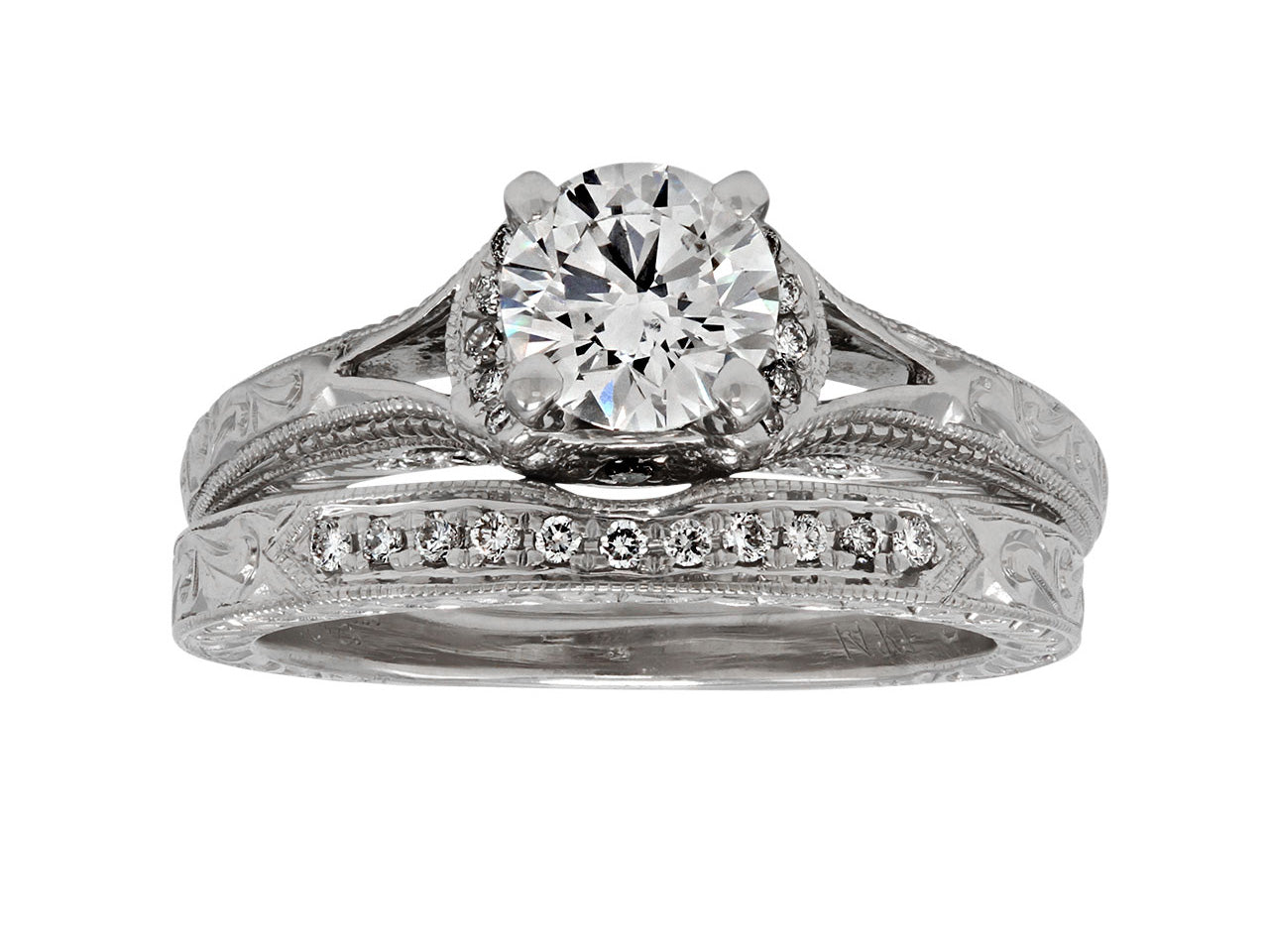 Diamond Ring, 0.73 carat, and Wedding Band in 14K White Gold, by Neil Lane