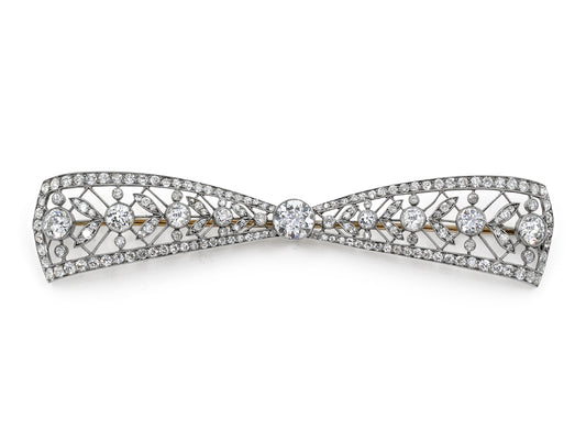 Antique Edwardian Diamond Bow Brooch in Platinum