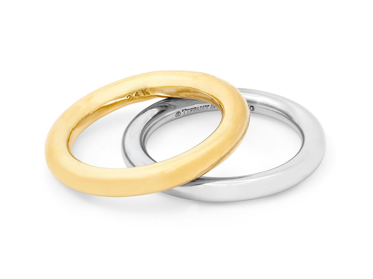 Set of Tiffany & Co. Platinum Wedding Band and 24K Yellow Gold Band