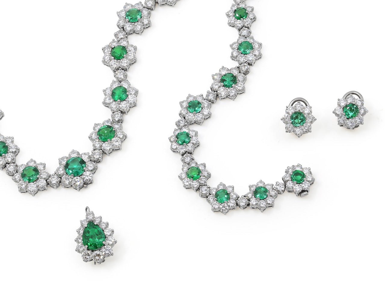 Suite of Emerald and Diamond Cluster Necklace, Bracelet and Earrings in Platinum