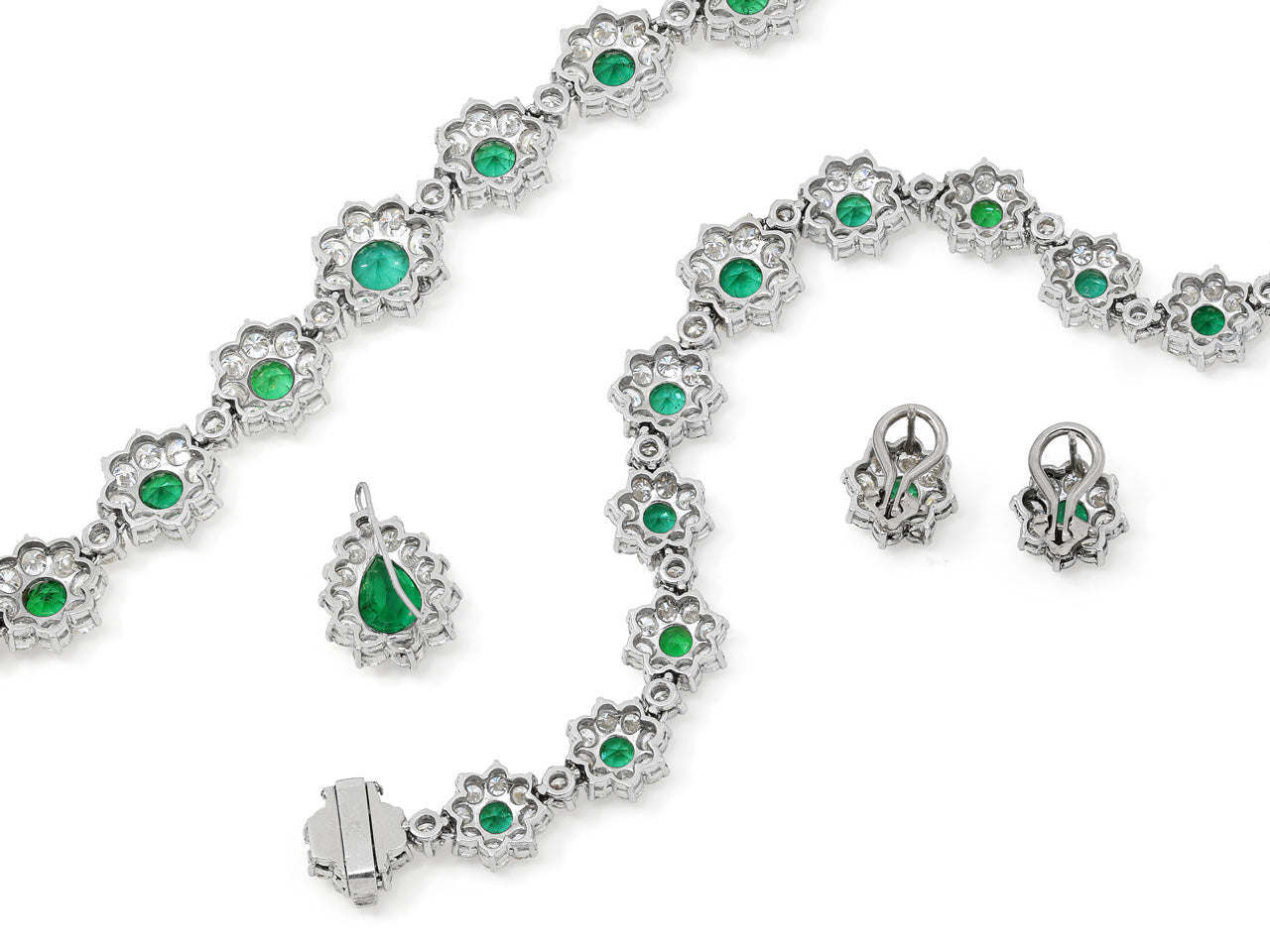 Suite of Emerald and Diamond Cluster Necklace, Bracelet and Earrings in Platinum